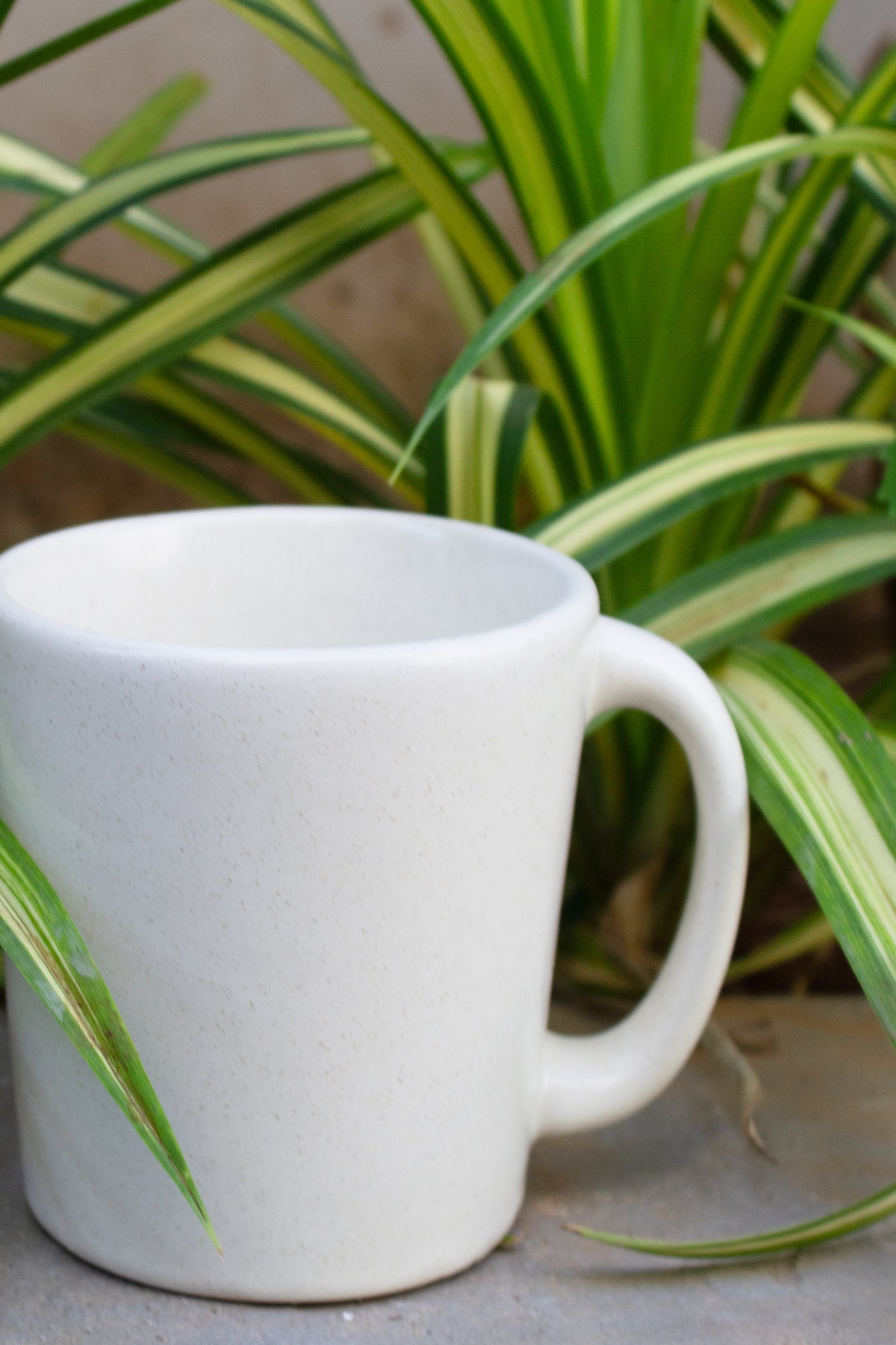 CERAMIC STONEWARE COFFEE MUG IN MILKY WHITE