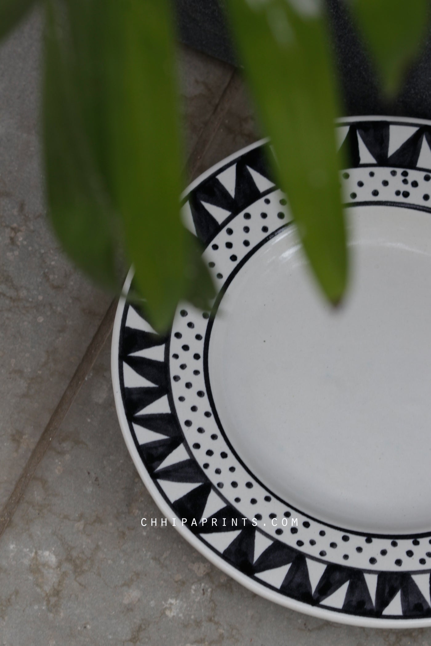 CERAMIC STONEWARE DOTS AND STRIPES STARTER PLATE IN BLACK