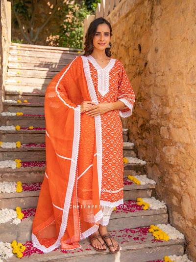 Cotton Buti Print V Neck Lace Kurta Suit Set in Burnt Orange